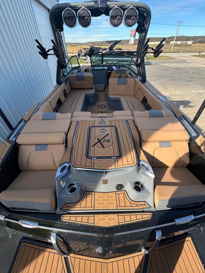Slide: The Image of 2025 MasterCraft X26 boat interior with luxurious seating and modern design. - 6