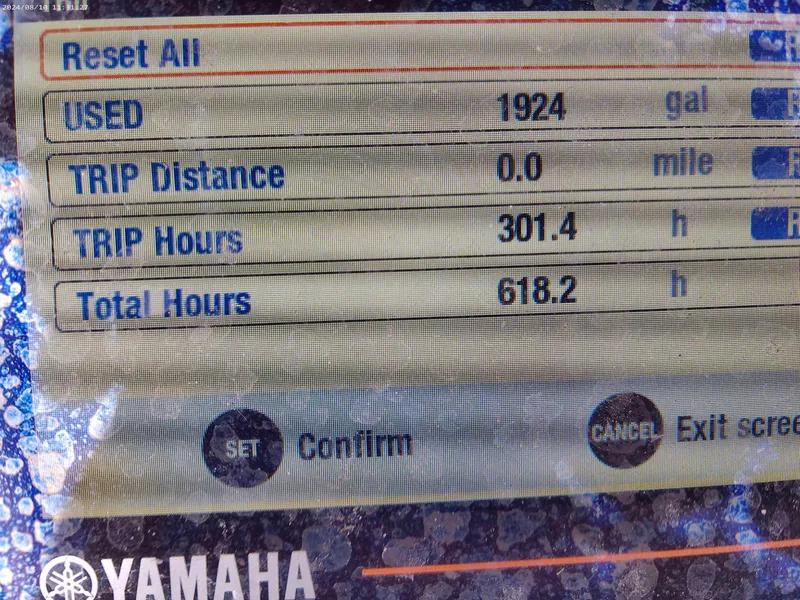 Slide: The Image of Yamaha display showing fuel usage and engine hours for 2019 Jones Brothers 26 Cape Fisherman. - 13