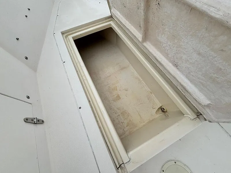 Slide: The Image of Open storage compartment on 1985 Grady-White 24 Fisherman boat. - 17