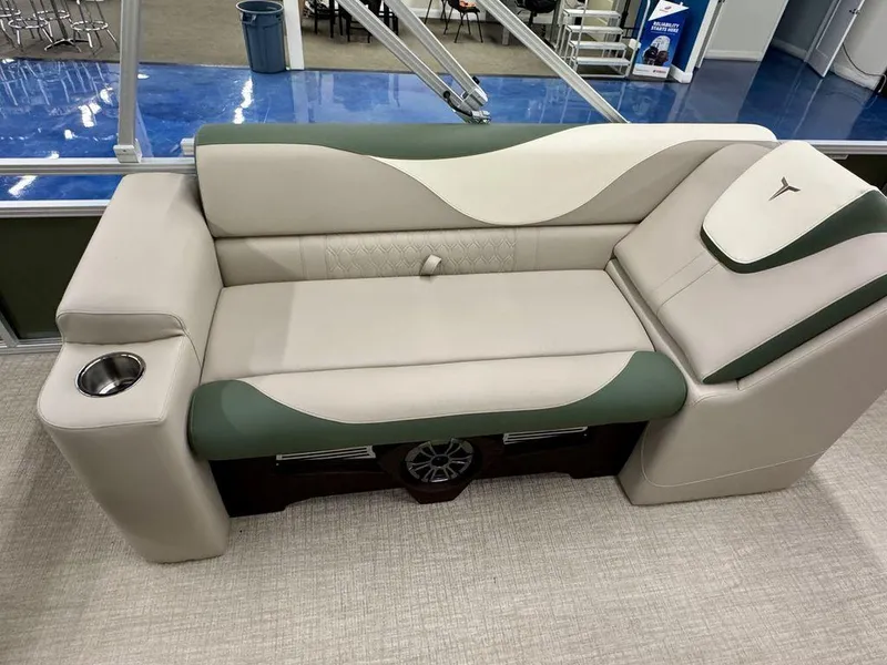 Slide: The Image of Luxurious seating in the 2025 Tahoe LTZ 23 Elite boat, featuring cup holder and stylish design. - 12