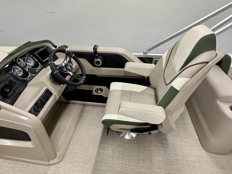 Slide: The Image of 2025 Tahoe LTZ 23 Elite boat interior with luxurious captain's chair and modern dashboard. - 13