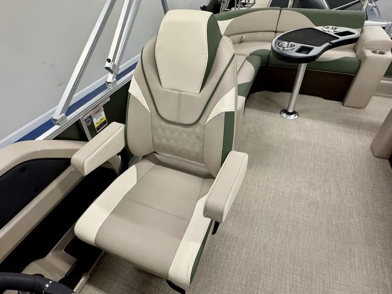 Slide: The Image of Luxurious seating in 2025 Tahoe LTZ 23 Elite boat with elegant design and cup holders. - 14