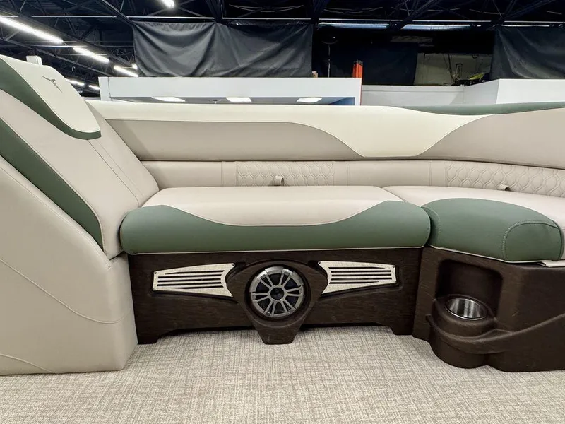 Slide: The Image of Luxurious interior seating of 2025 Tahoe LTZ 23 Elite with integrated speaker and cup holder. - 17