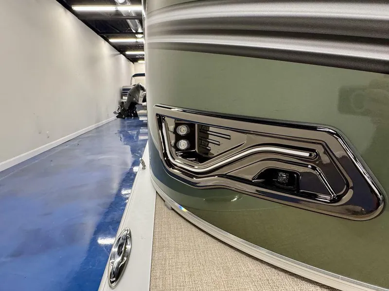Slide: The Image of 2025 Tahoe LTZ 23 Elite boat detail with sleek design and modern lighting. - 4