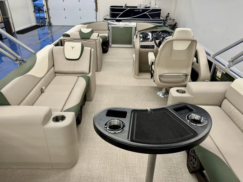 Slide: The Image of Luxurious interior of 2025 Tahoe LTZ 23 Elite pontoon boat with plush seating and modern amenities. - 9