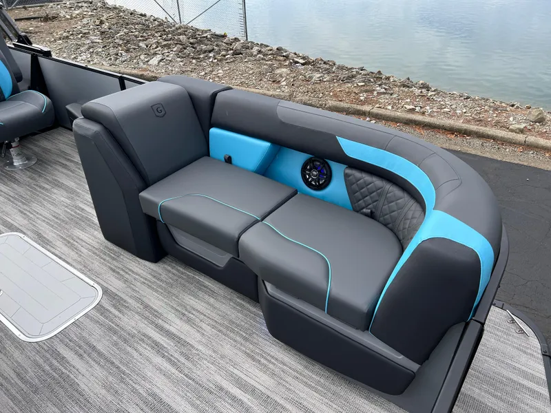 Slide: The Image of 2025 Godfrey Sweetwater 2286 sFLC TRI PWR STR boat interior with stylish seating. - 11