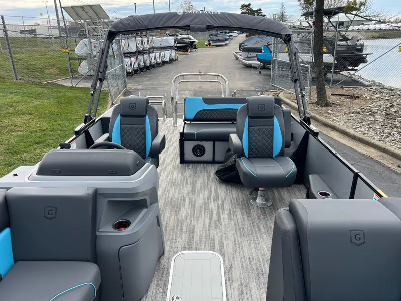 Slide: The Image of 2025 Godfrey Sweetwater 2286 sFLC TRI PWR STR pontoon boat interior with modern seating. - 13
