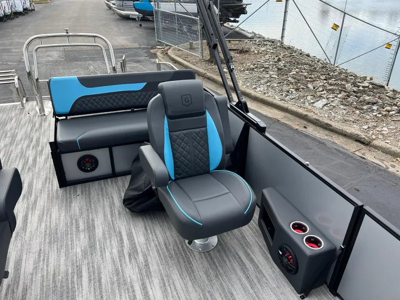 Slide: The Image of 2025 Godfrey Sweetwater 2286 sFLC TRI PWR STR boat interior with modern seating. - 14