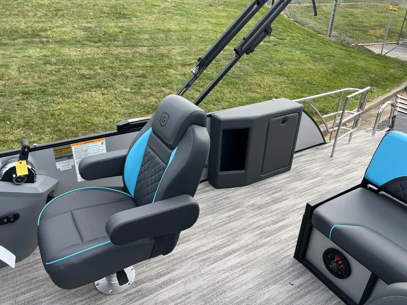Slide: The Image of 2025 Godfrey Sweetwater 2286 sFLC TRI PWR STR boat interior with sleek seating and modern design. - 15