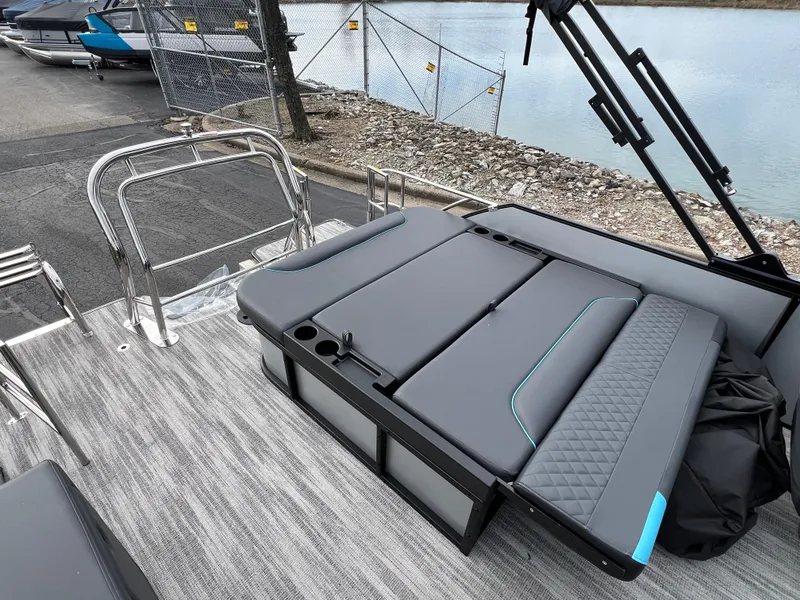 Slide: The Image of 2025 Godfrey Sweetwater 2286 sFLC TRI PWR STR boat with sleek seating and modern design. - 18