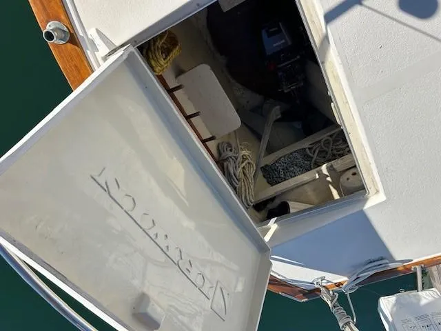 Slide: The Image of Open hatch on 1980 Irwin 46 Ketch sailboat, showing storage compartment. - 20