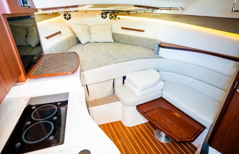 Slide: The Image of Interior of 2021 Grady-White Express 330 boat with cozy seating and modern amenities. - 17
