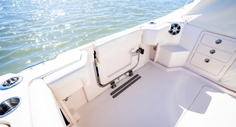 Slide: The Image of 2021 Grady-White Express 330 boat interior with storage and water view. - 9