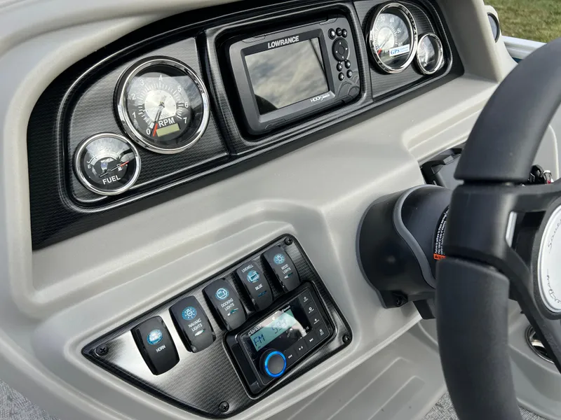 Slide: The Image of Dashboard of 2025 South Bay 222 CR2 LE boat with gauges and controls. - 17