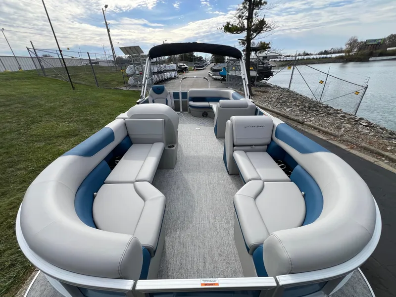 Slide: The Image of 2025 South Bay 222 CR2 LE pontoon boat with spacious seating and modern design. - 7