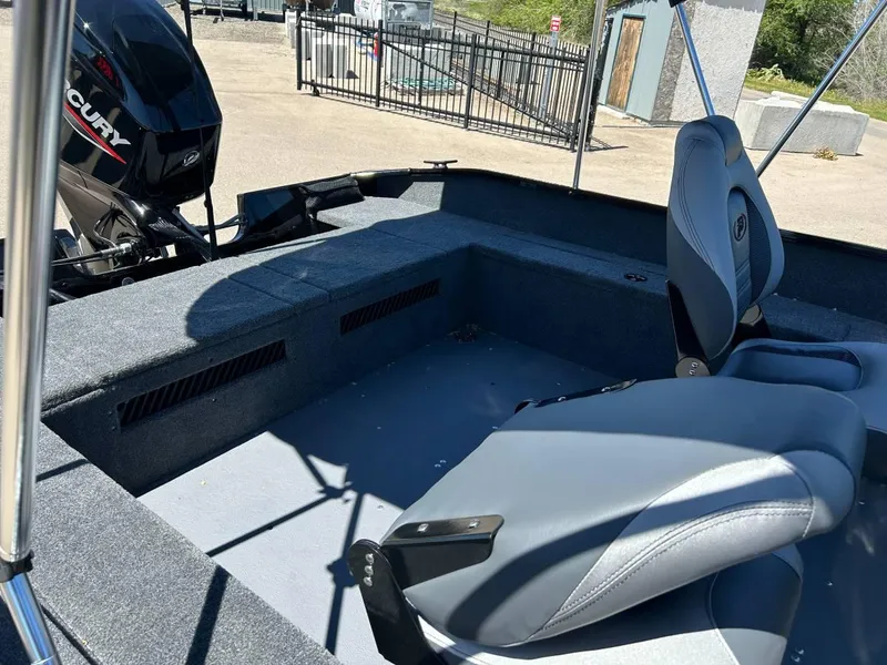 Slide: The Image of 2024 Princecraft Holiday 162 WS MAX boat interior with seating and Mercury motor. - 3