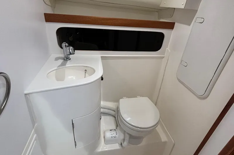 Slide: The Image of 2025 NorthCoast 285 Cabin bathroom with compact sink and toilet. - 25