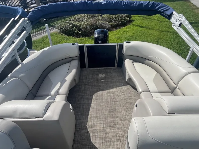 Slide: The Image of 2022 Cypress Cay Seabreeze 232 pontoon boat with spacious seating and modern design. - 5