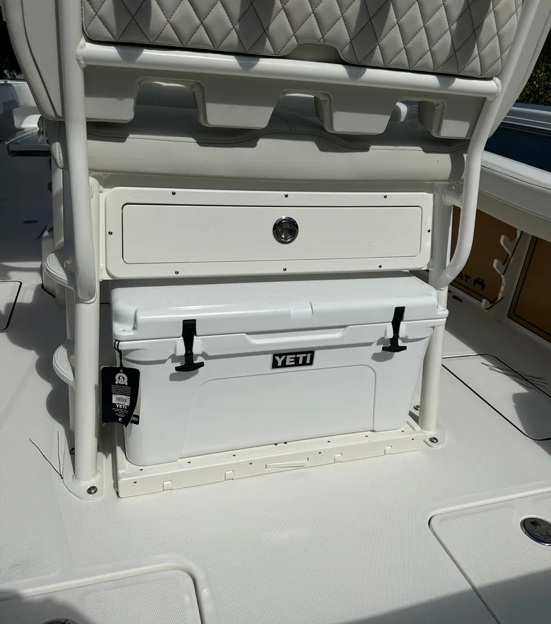 Slide: The Image of 2025 World Cat 260 CC-X boat with Yeti cooler on deck. - 15