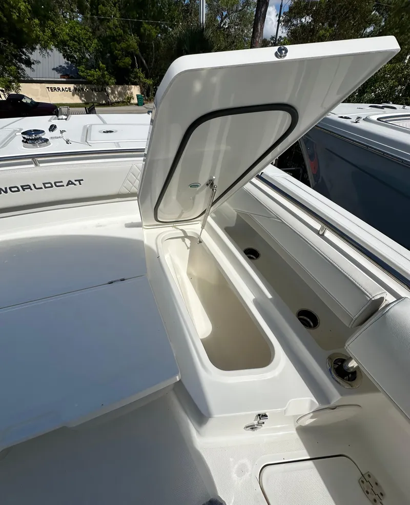 Slide: The Image of 2025 World Cat 260 CC-X boat with open storage compartment. - 16