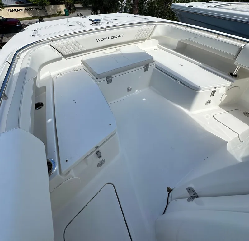 Slide: The Image of 2025 World Cat 260 CC-X boat interior with spacious seating and storage. - 6