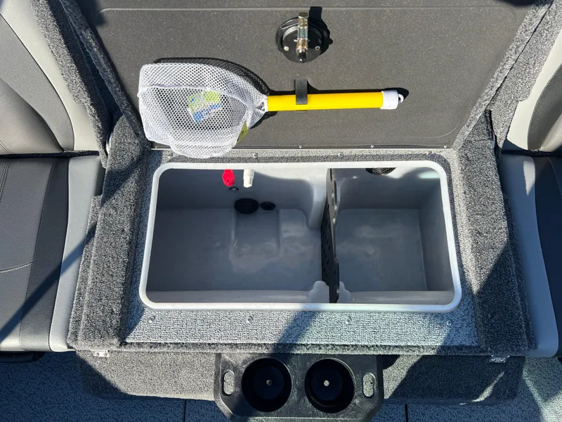 Slide: The Image of 2025 Lund 1775 Impact XS Sport boat livewell with net and cup holders. - 24