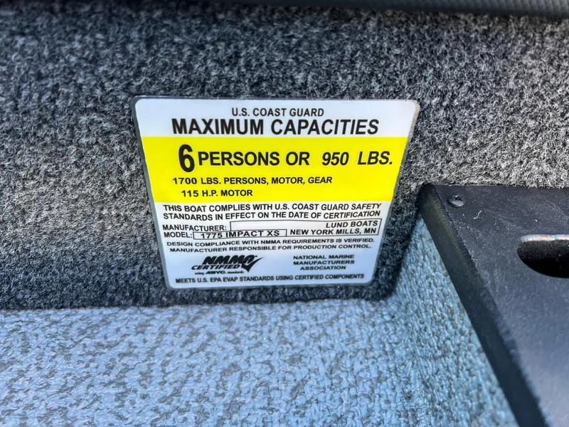 Slide: The Image of Lund 1775 Impact XS Sport 2025 capacity label, 6 persons or 950 lbs, 115 HP motor. - 27