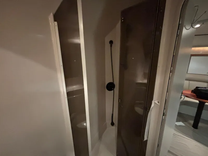 Slide: The Image of 1998 Cruisers Yachts 3870 Esprit bathroom interior with shower and modern fixtures. - 16