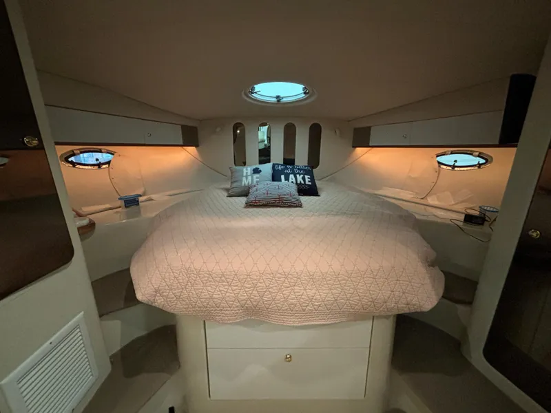 Slide: The Image of Cozy cabin interior of 1998 Cruisers Yachts 3870 Esprit with plush bedding. - 17