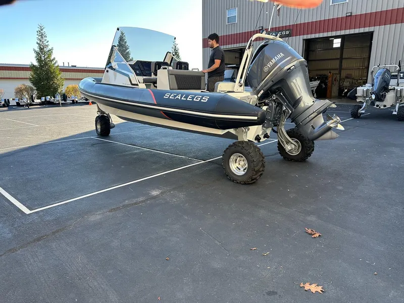 Slide: The Image of 2020 Sealegs 7.5 Semi Cabin boat with Yamaha engine on land. - 4