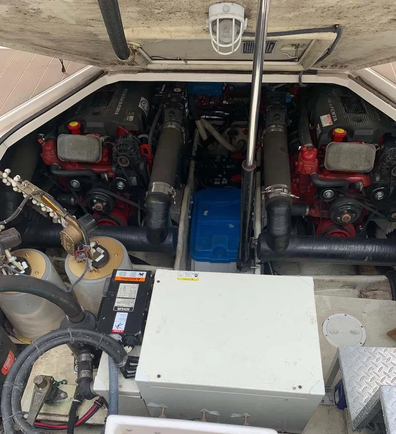 Slide: The Image of 2005 Regal Commodore 3560 engine compartment with dual engines and mechanical components. - 15