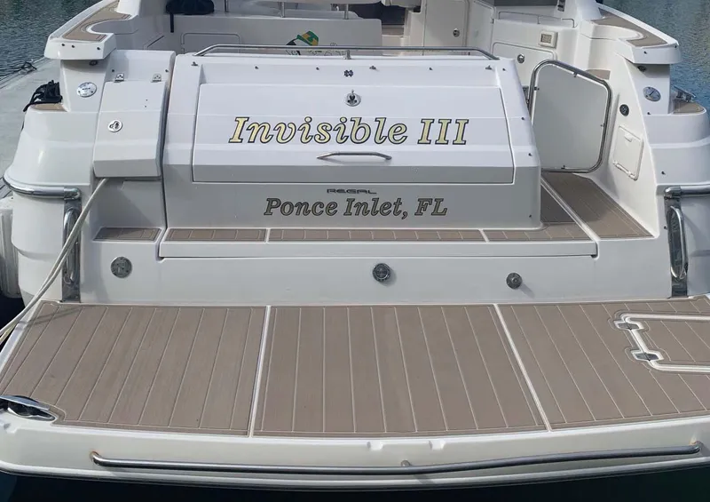 Slide: The Image of 2005 Regal Commodore 3560 boat, named Invisible III, docked at Ponce Inlet, FL. - 17