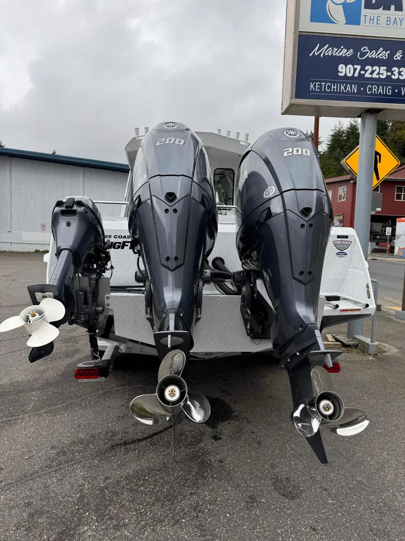 Slide: The Image of 2025 KingFisher 2825 Coastal Express with twin 200 horsepower outboard motors. - 3
