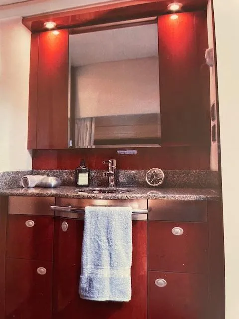 Slide: The Image of Luxurious bathroom interior of 2008 Sea Ray 48 Sundancer yacht with elegant wood cabinetry. - 11