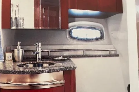 Slide: The Image of Luxurious 2008 Sea Ray 48 Sundancer yacht interior with modern kitchen amenities. - 13