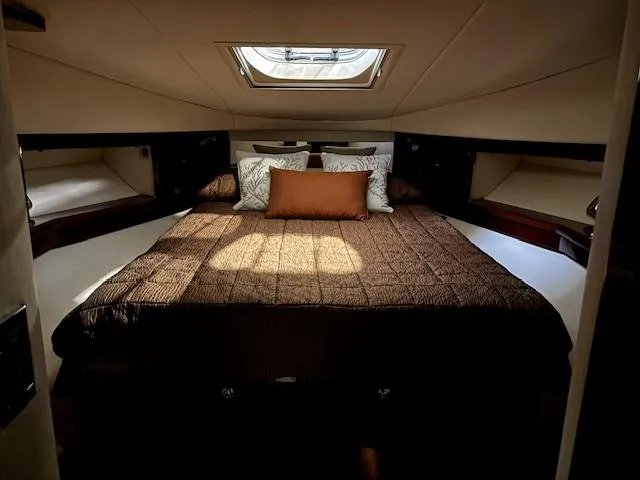 Slide: The Image of Luxurious cabin interior of 2009 Sea Ray 48 Sundancer yacht with cozy bedding. - 24