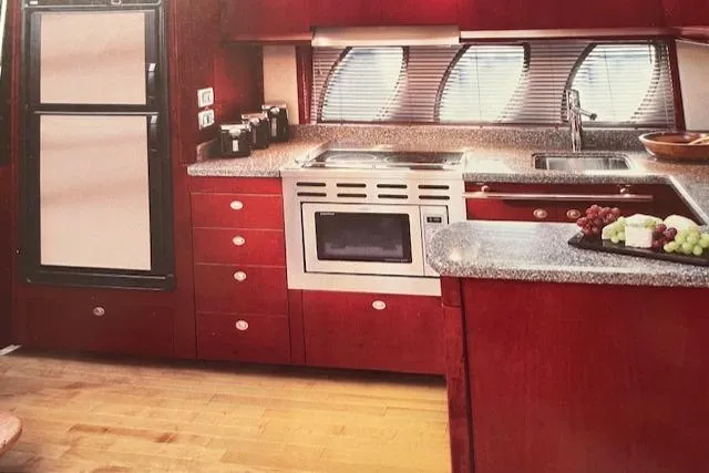 Slide: The Image of Luxurious kitchen interior of 2008 Sea Ray 48 Sundancer yacht with modern appliances. - 5
