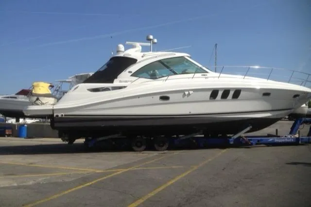 Slide: The Image of 2008 Sea Ray 48 Sundancer yacht on trailer at marina. - 7