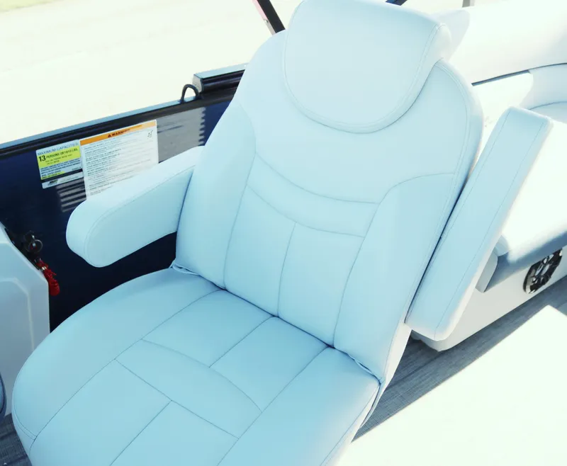 Slide: The Image of Luxurious white seat in 2021 Sweetwater 2186 MT boat interior. - 11