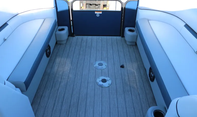 Slide: The Image of Interior of 2021 Sweetwater 2186 MT boat with spacious seating and cup holders. - 12