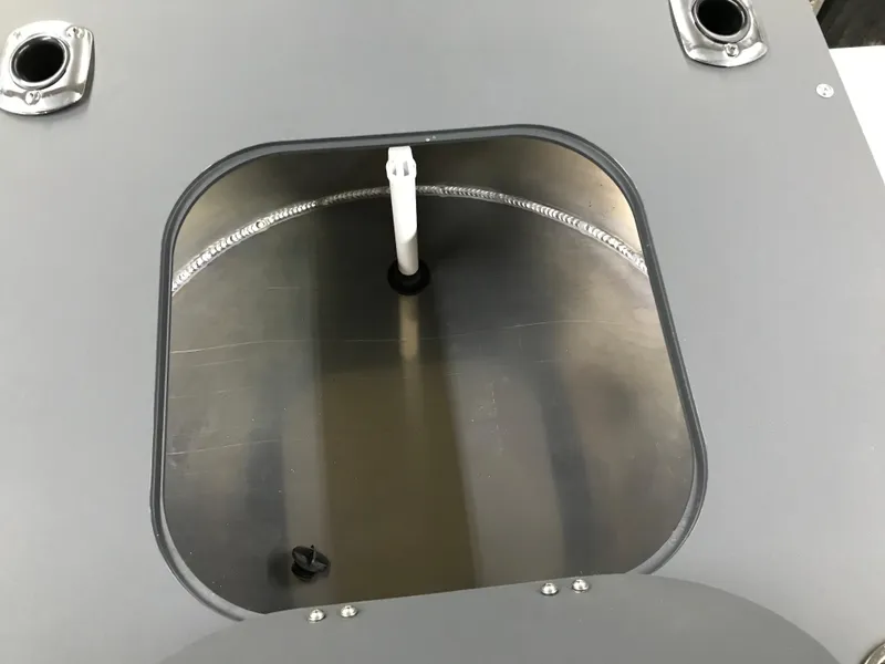 Slide: The Image of 2025 Avalon GEOfish REAR FISH compartment with open hatch, showcasing interior details. - 20