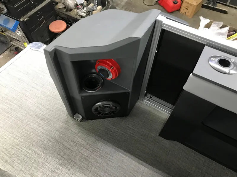 Slide: The Image of Avalon GEOfish REAR FISH 2025 boat interior with speaker and cup holder. - 21