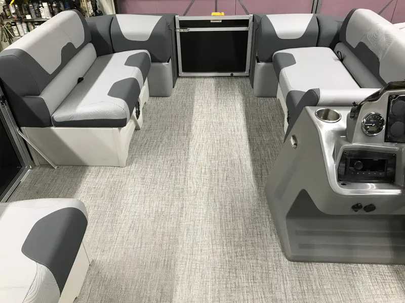 Slide: The Image of 2025 Avalon GEOfish REAR FISH boat interior with gray seating and modern console. - 36