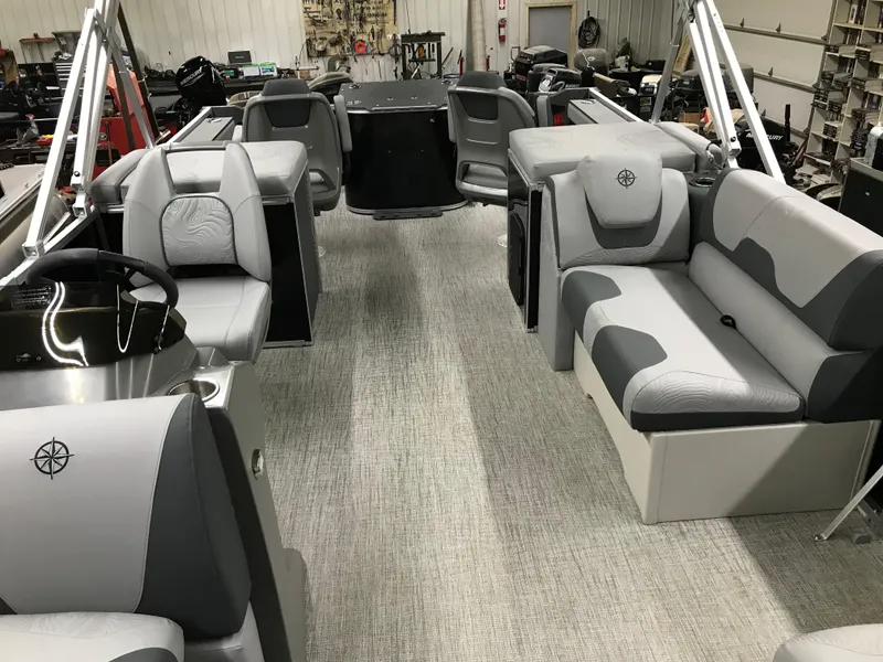 Slide: The Image of 2025 Avalon GEOfish REAR FISH boat interior with gray seating and modern design. - 37