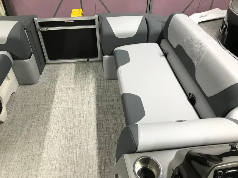 Slide: The Image of 2025 Avalon GEOfish REAR FISH boat interior with gray seating and modern design. - 39