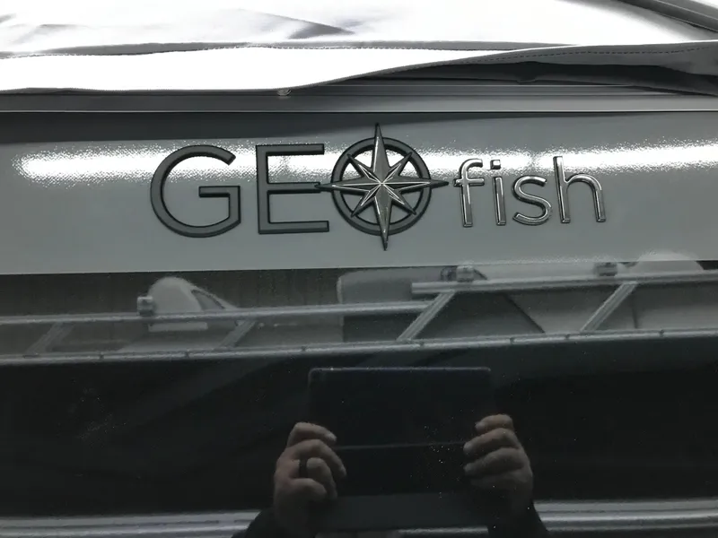 Slide: The Image of Avalon GEOfish REAR FISH 2025 logo with compass design on vehicle surface. - 44