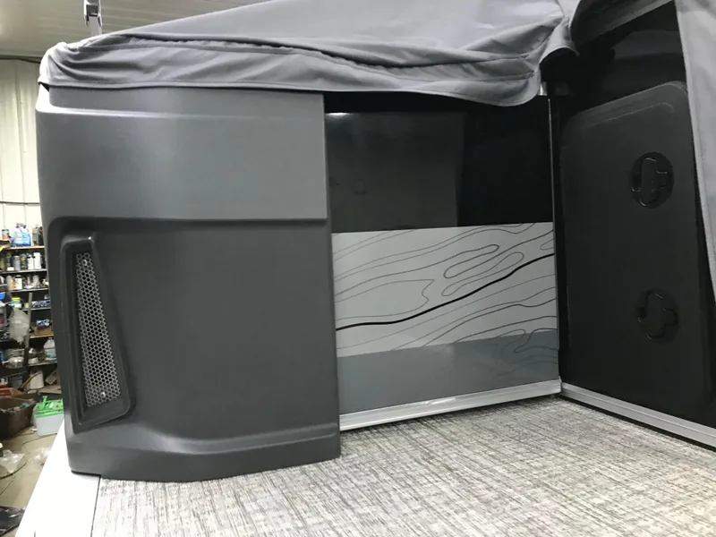 Slide: The Image of 2025 Avalon GEOfish REAR FISH boat interior with sleek design and modern features. - 49