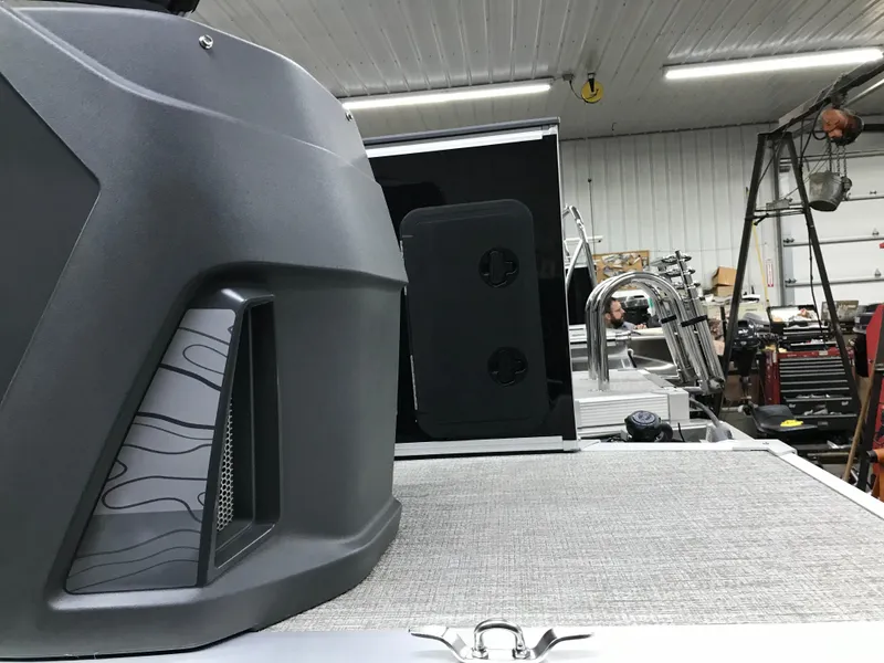 Slide: The Image of Avalon GEOfish REAR FISH 2025 boat detail in a workshop setting. - 9