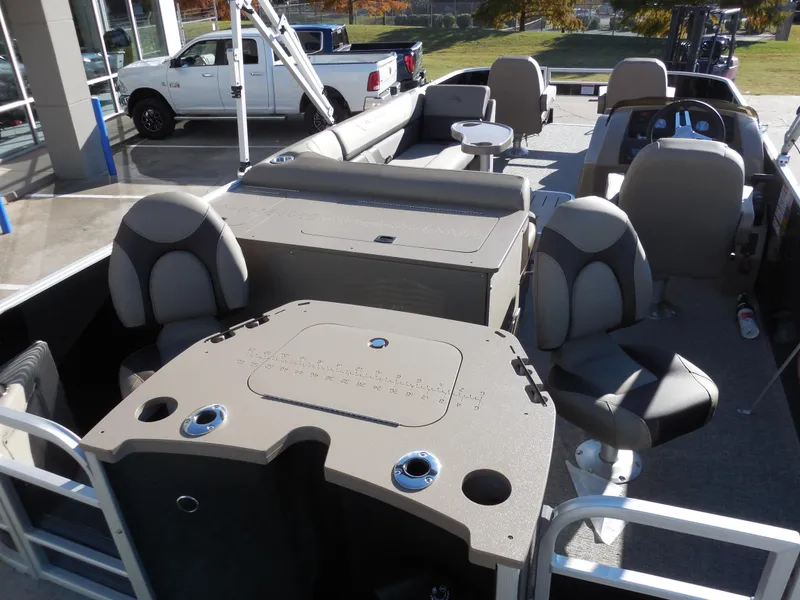 Slide: The Image of 2025 Bennington 22 SFX APG boat interior with seating and fishing setup. - 9