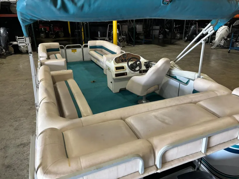 Slide: The Image of 1998 Godfrey AquaPatio 240 LE pontoon boat with spacious seating and covered helm. - 7